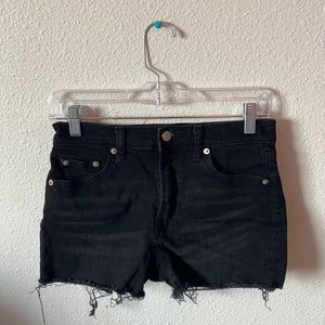 Black distressed jean shorts